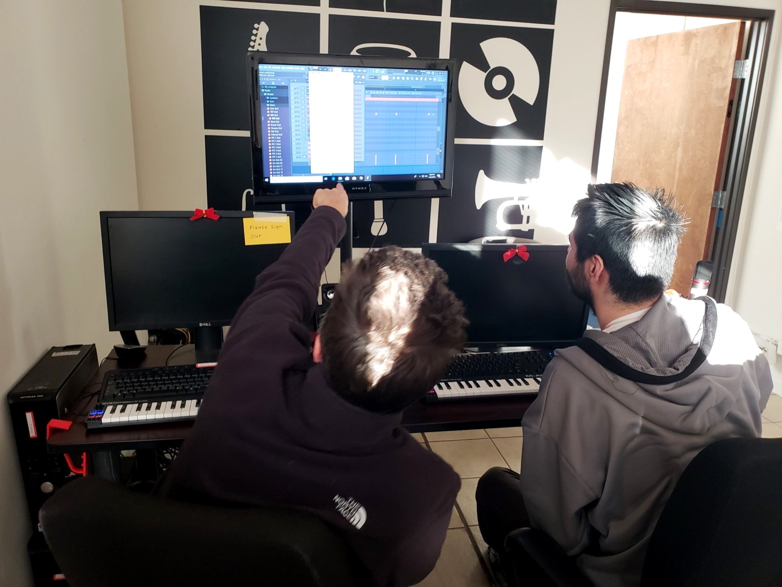 A musician working with an instructor