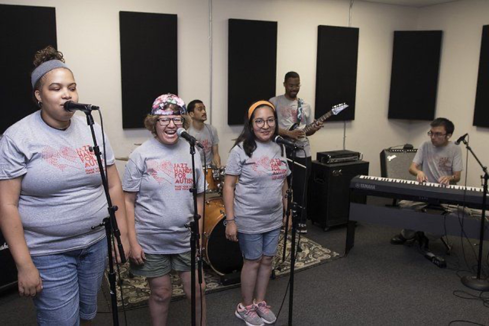 A Jazz Hands band rehearses inside the studio