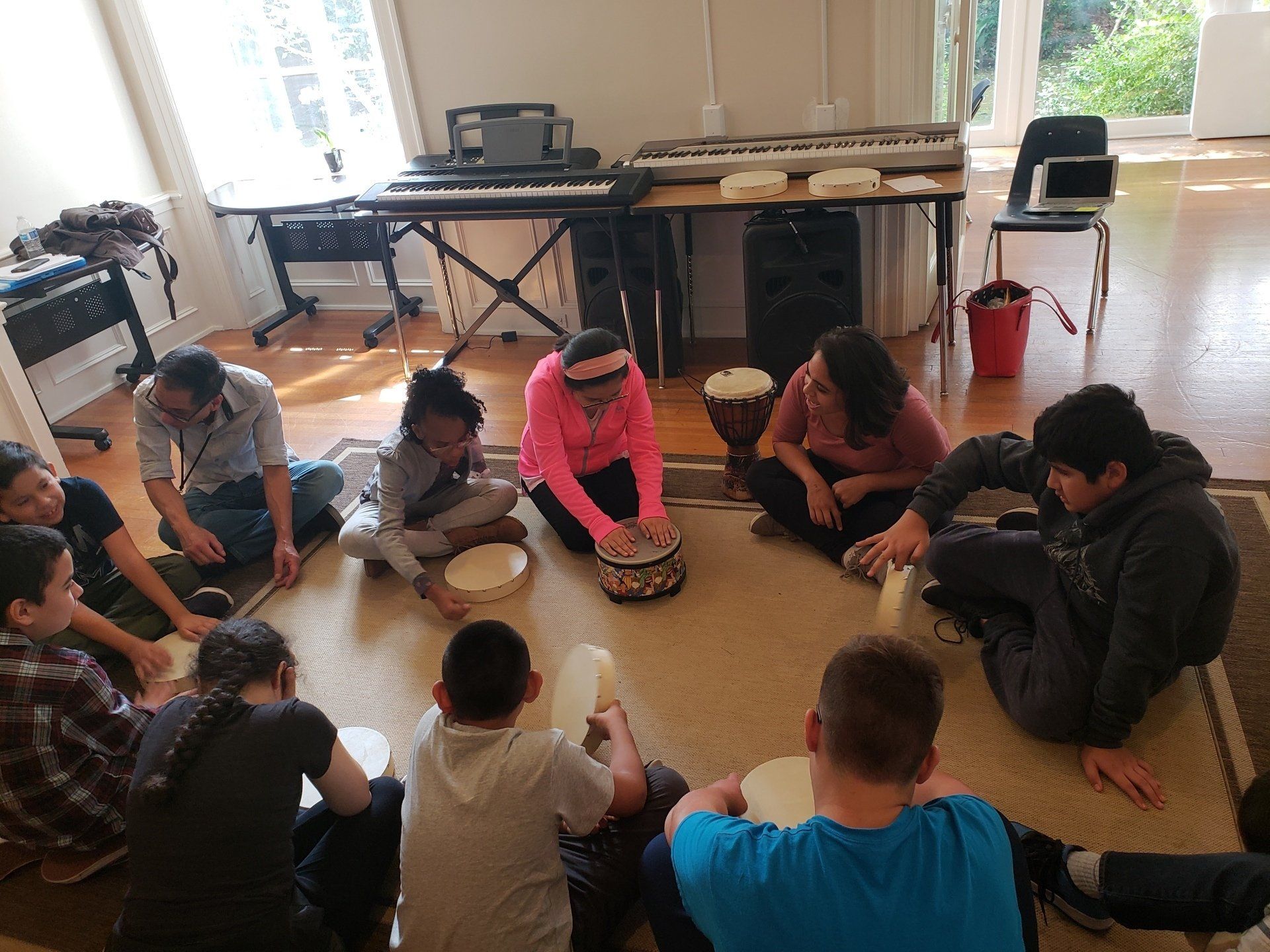 Young musicians in a Junior Academy drum circle