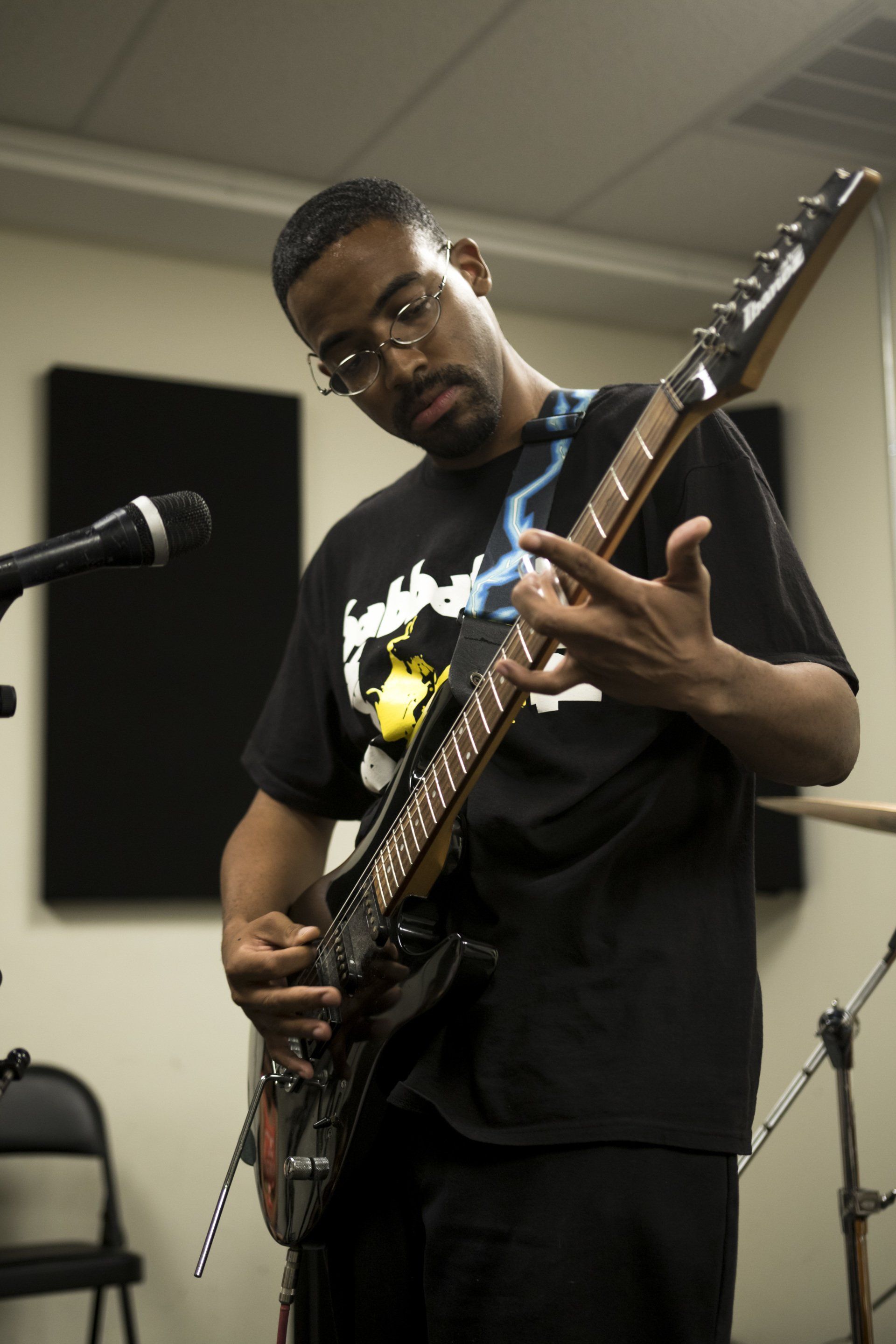 A bassist records in the Jazz Hands studio