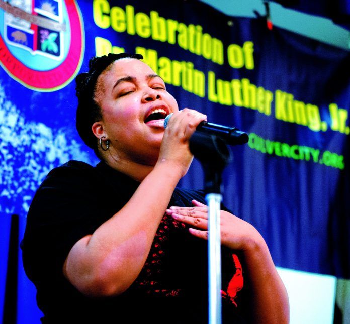 A vocalist performs at Culver City's Dr. Martin Luther King Jr. celebration